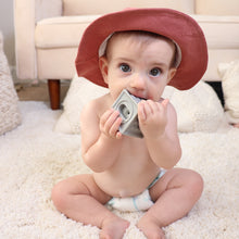 Load image into Gallery viewer, A baby sitting wearing red cotton baby bucket hat