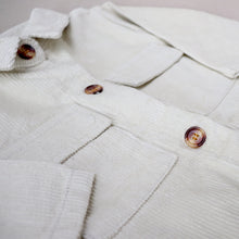 Load image into Gallery viewer, Baby white button down corduroy jumpsuit with two pockets