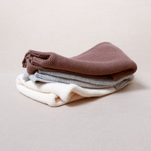 Load image into Gallery viewer, Three baby cotton knit jumpers folded stack on each other from top to bottom: brown, grey, white