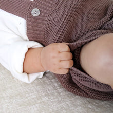 Load image into Gallery viewer, Baby's hand holding bottom of brown cotton knit jumper
