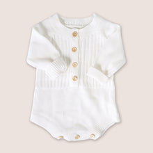 Load image into Gallery viewer, Baby white long sleeved knit romper with four buttons in the center and three buttons at crotch opening