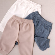 Load image into Gallery viewer, Baby pants with elasticized waist and banded leg opening: cream, camel and charcoal