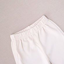 Load image into Gallery viewer, Elasticized waist of cream baby pants
