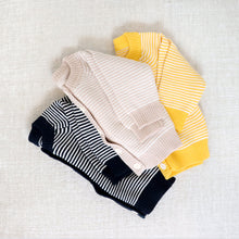 Load image into Gallery viewer, Folded navy, tan and yellow striped cotton baby button down cardigans