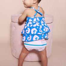 Load image into Gallery viewer, toddler standing facing the wall wearing blue and pink cheetah tankini