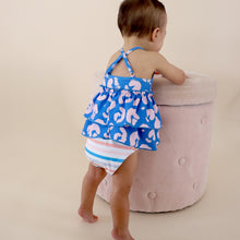 Load image into Gallery viewer, toddler standing facing the wall wearing blue and pink cheetah tankini