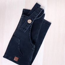 Load image into Gallery viewer, baby blue denim overalls folded to see the front pocket, adjustable straps with button fastening