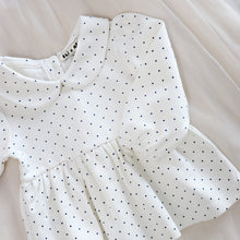 Load image into Gallery viewer, white baby tunic with navy blue polka dots and peter pan collar