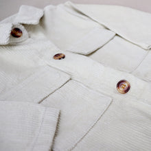 Load image into Gallery viewer, Baby white button down corduroy jumpsuit with two pockets
