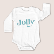 Load image into Gallery viewer, White long-sleeved baby onesie with the word jolly written on it in blue on a grey background
