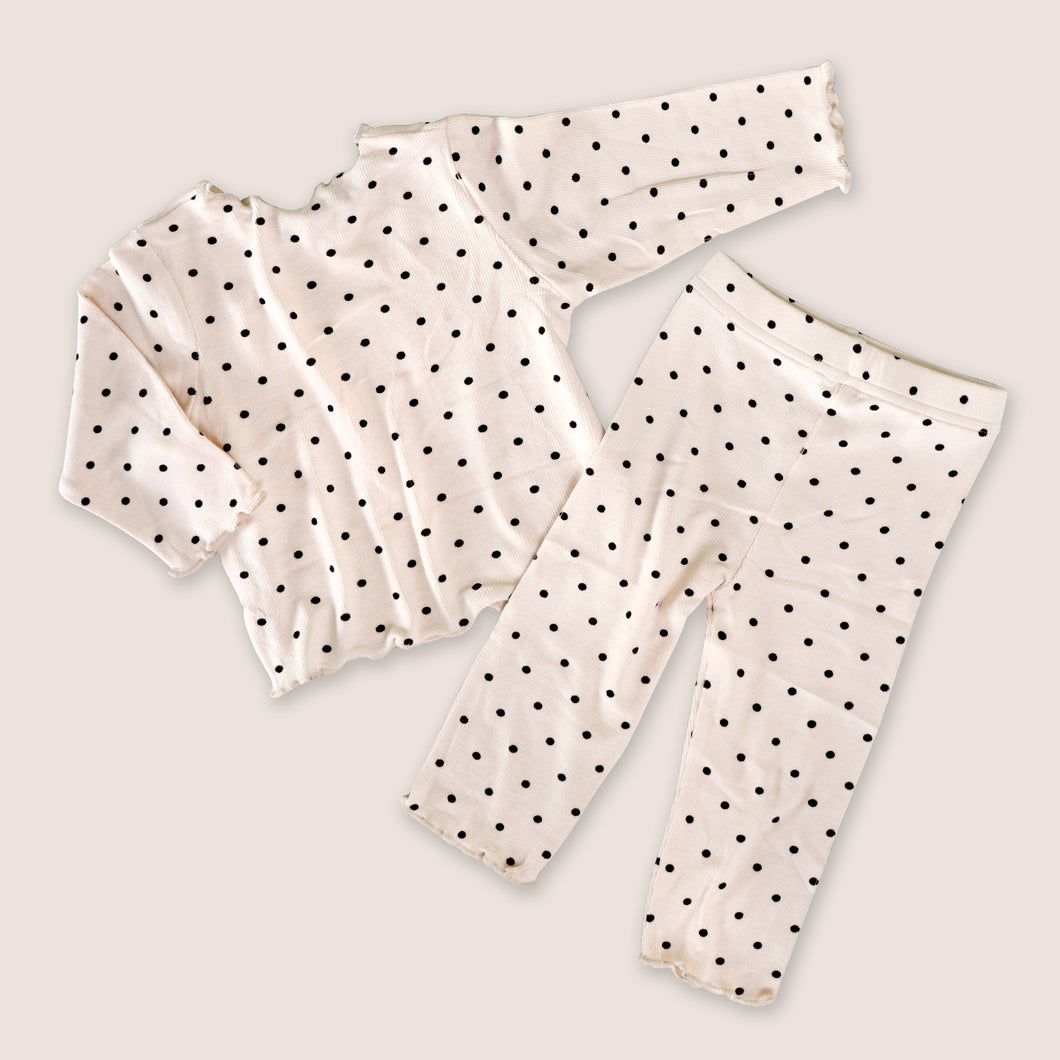 Baby long sleeved cotton apricot top with black polka dots and matching apricot cotton pants with black polka dots