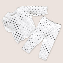 Load image into Gallery viewer, Baby long sleeved cotton white top with black polka dots and matching white cotton pants with black polka dots
