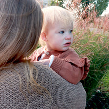 Load image into Gallery viewer, Baby being held wearing brown baby flutter long sleeved cardigan
