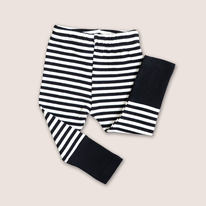 Baby black and white striped cotton leggings with a black cuffed ribbed bottom 