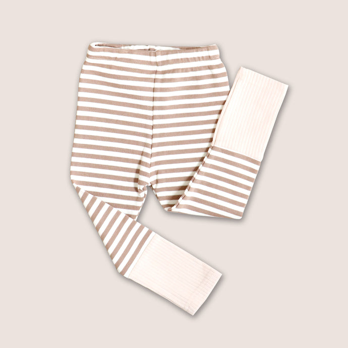 Baby tan and white striped cotton leggings with a tan cuffed ribbed bottom 