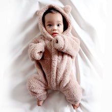 Load image into Gallery viewer, Baby laying wearing fuzzy light brown baby bear winter zippered onesie
