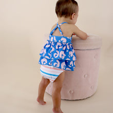 Load image into Gallery viewer, toddler standing facing the wall wearing blue and pink cheetah tankini
