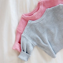 Load image into Gallery viewer, grey and pink knitted baby sweaters laying on top of each other
